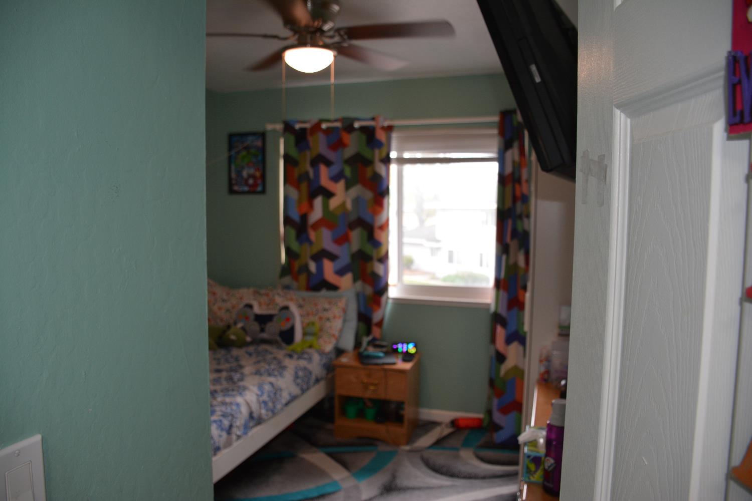 5630 Allen Avenue, Unit 4 San Jose, CA 95123 - Photo 12 of 23 a room with wooden floor and a window