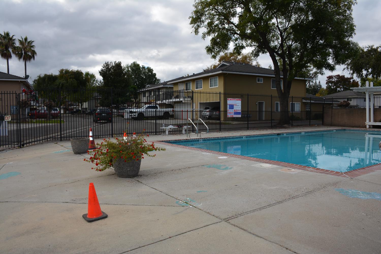 5630 Allen Avenue, Unit 4 San Jose, CA 95123 - Photo 22 of 23 a wooden bench sitting in front of a building