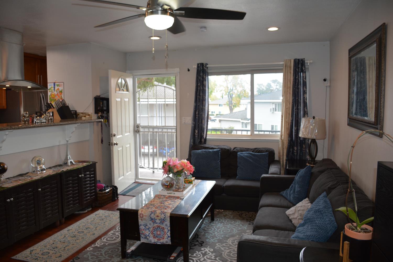 5630 Allen Avenue, Unit 4 San Jose, CA 95123 - Photo 6 of 23 a living room with furniture and a large window