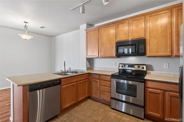 $305,000 | 2662 South Cathay Way, Unit 303, Aurora, CO 80013