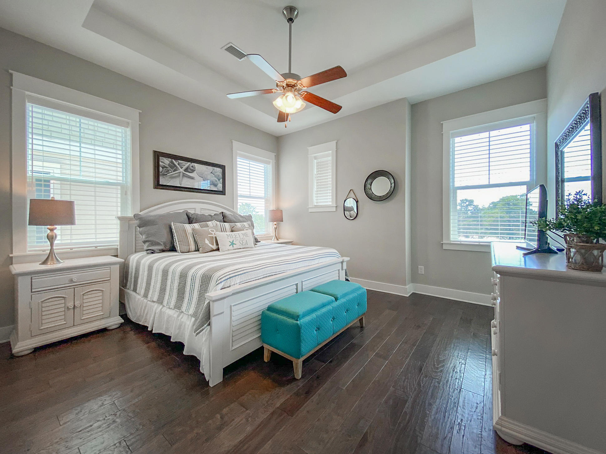 79 Milestone Dr Inlet Beach, Unit A Inlet Beach, FL 32461 - Photo 14 of 34 a bedroom with a bed and a large window