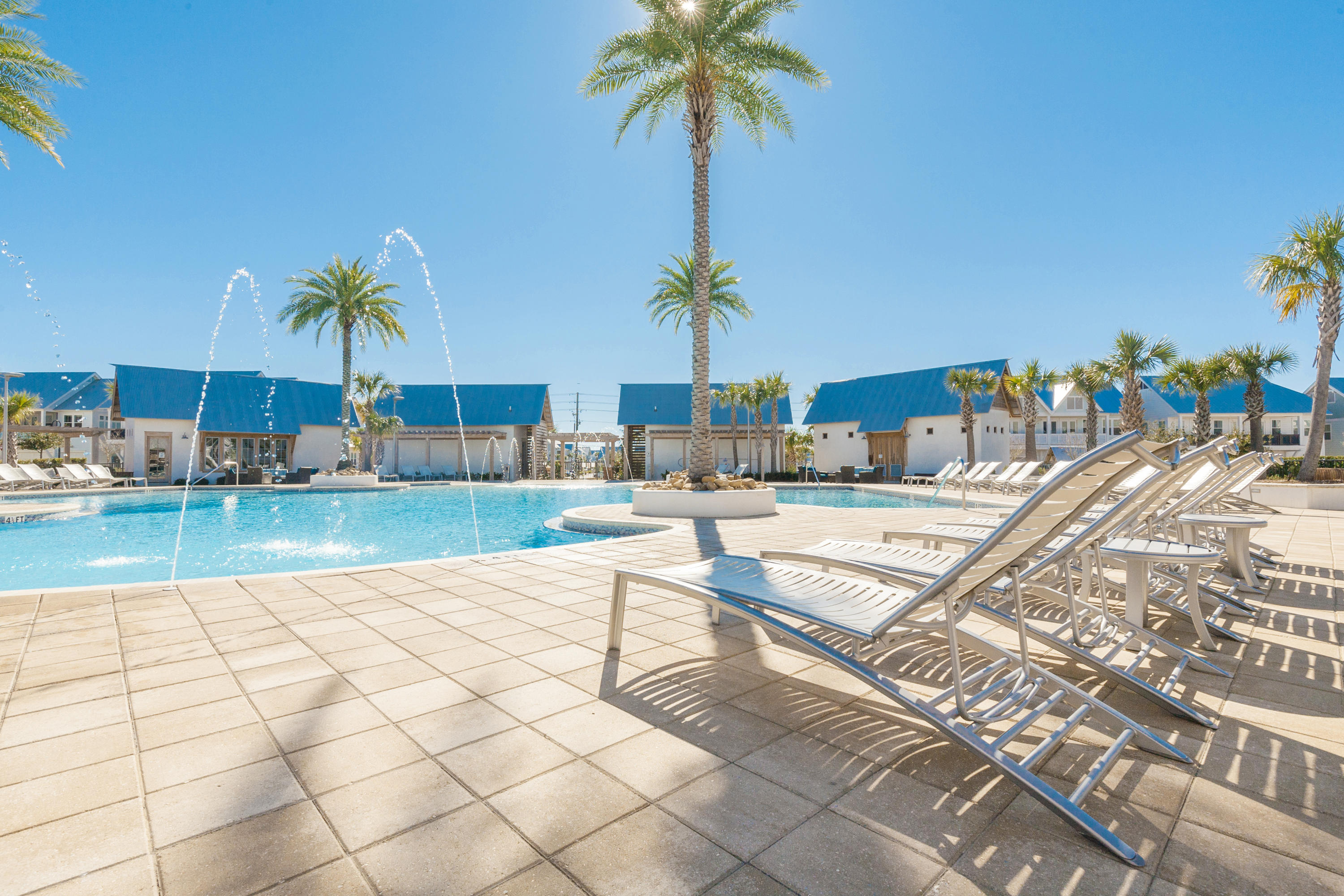 79 Milestone Dr Inlet Beach, Unit A Inlet Beach, FL 32461 - Photo 27 of 34 a swimming pool with outdoor seating and yard