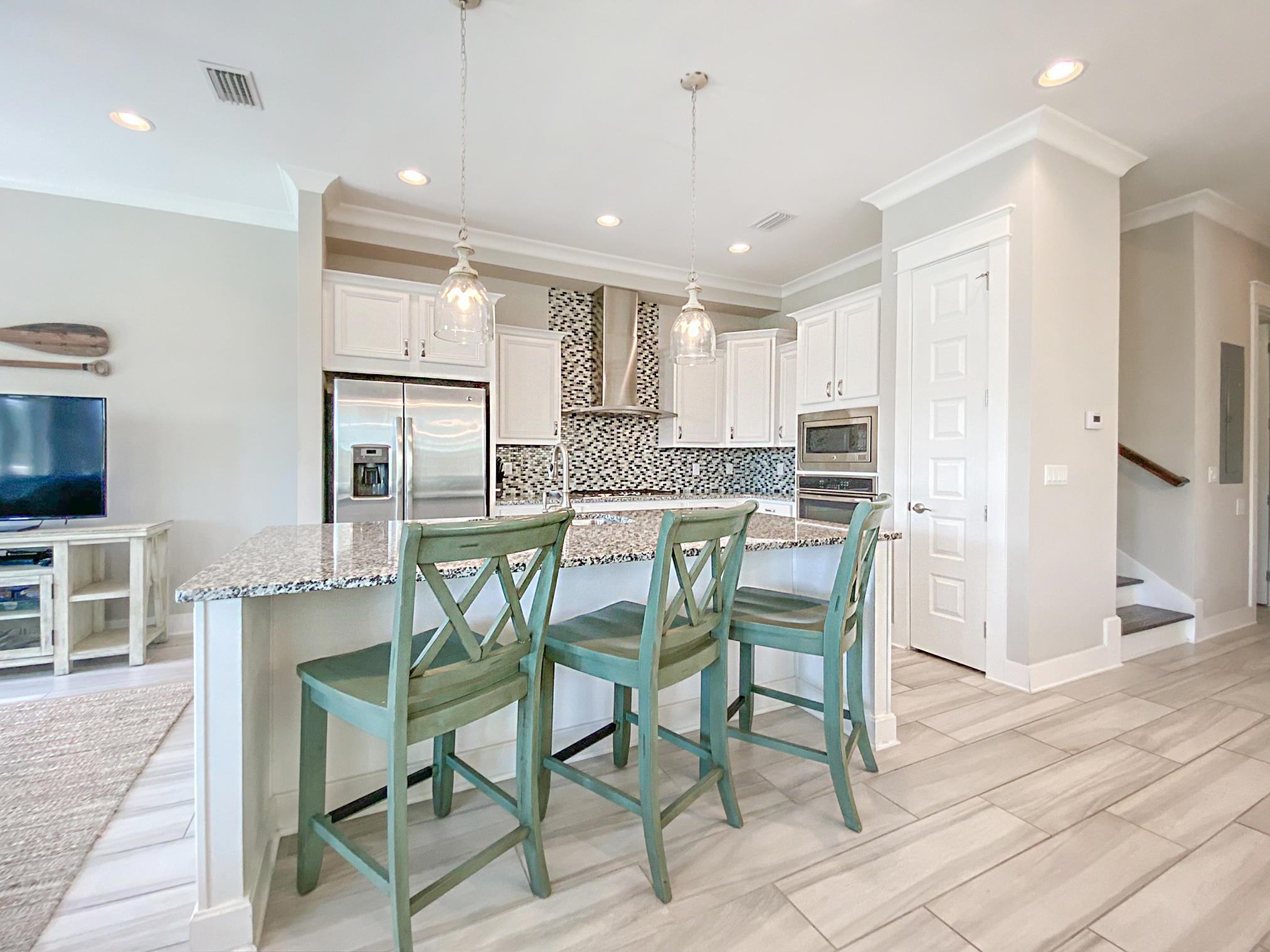 79 Milestone Dr Inlet Beach, Unit A Inlet Beach, FL 32461 - Photo 3 of 34 a view of a dining room with furniture and wooden floor