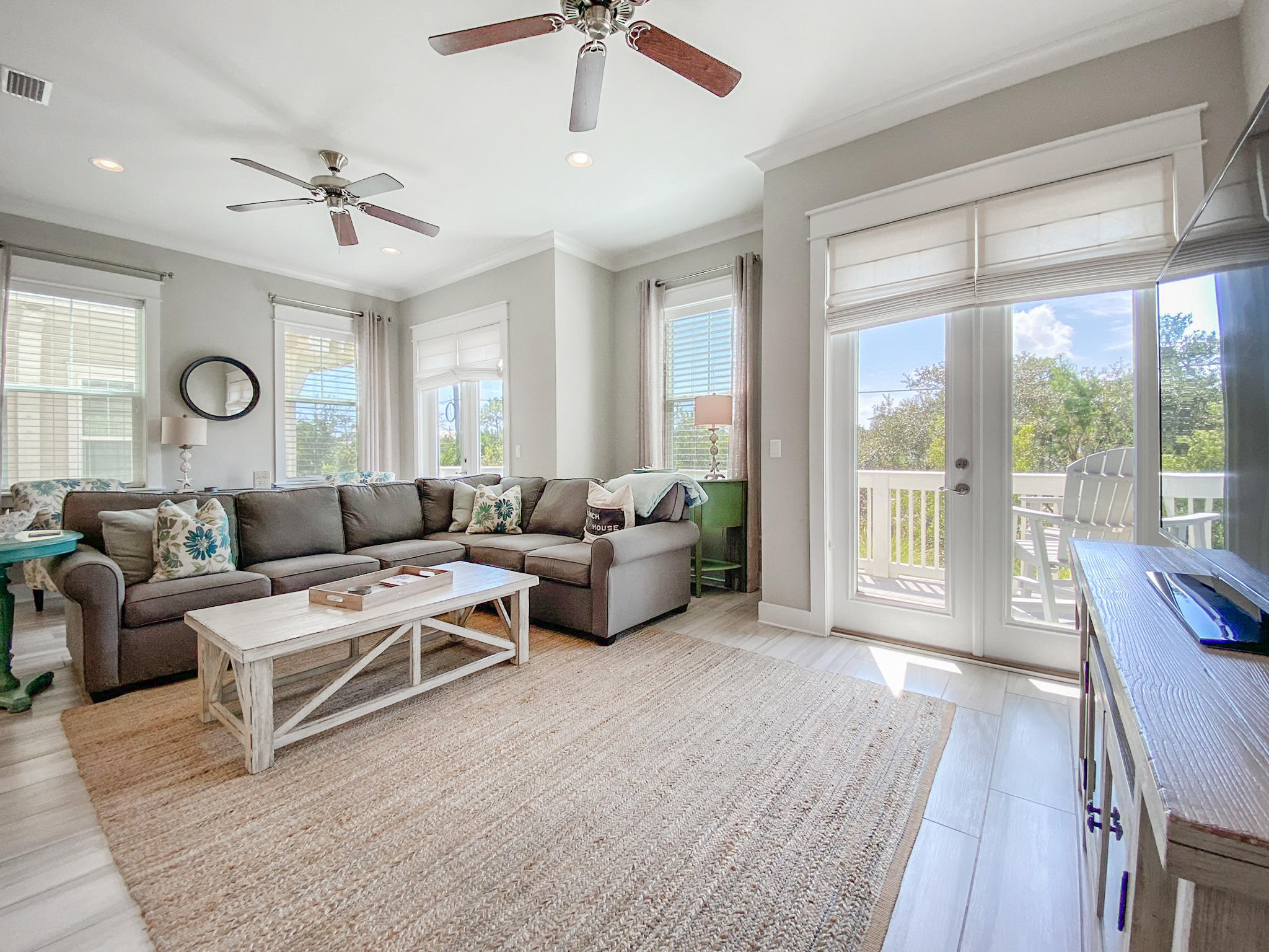 79 Milestone Dr Inlet Beach, Unit A Inlet Beach, FL 32461 - Photo 6 of 34 a living room with furniture and a large window