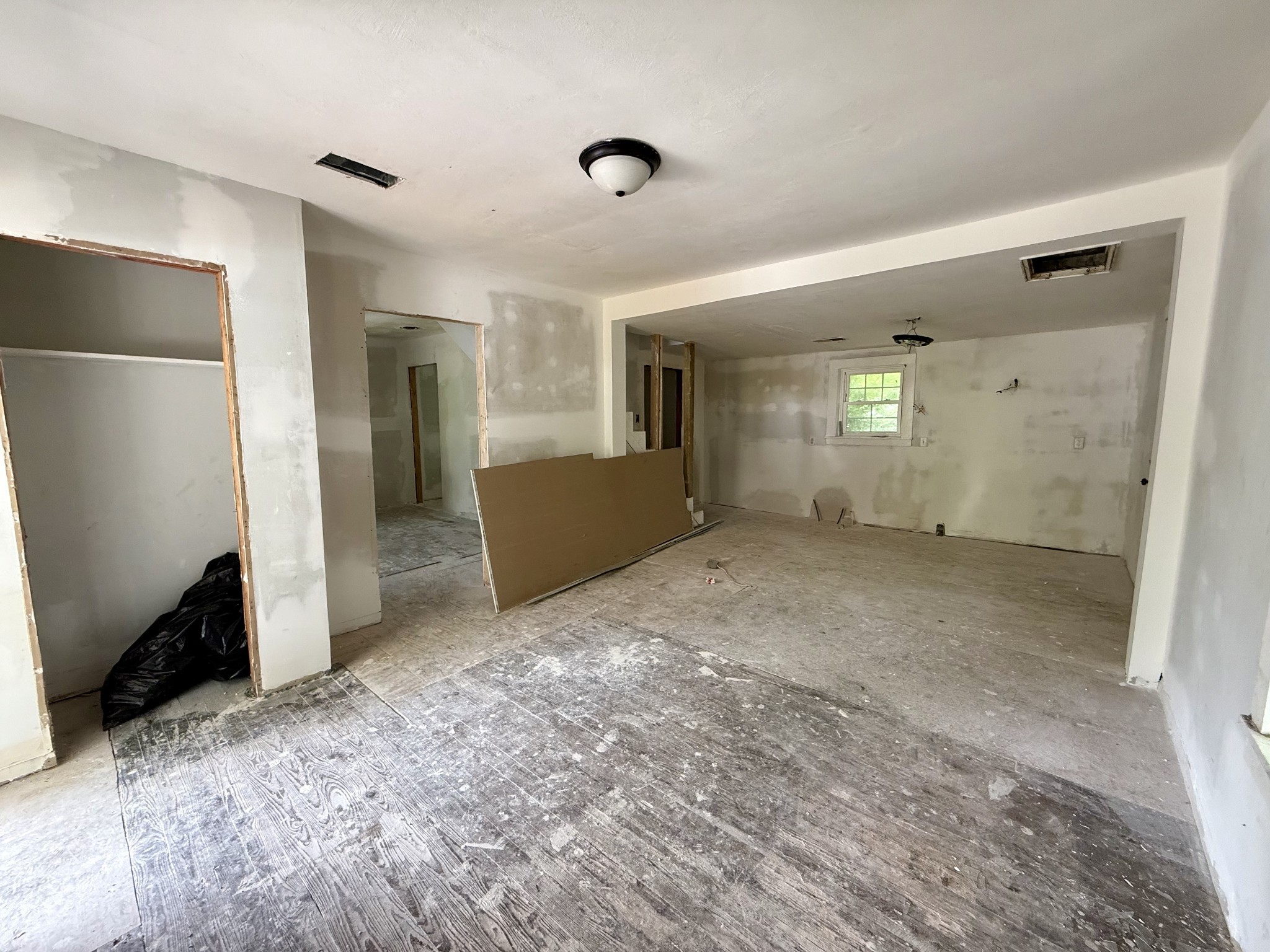 10261-2 Bridge Street Columbia, TN 38401 - Photo 2 of 14 a view of livingroom with hardwood floor and window