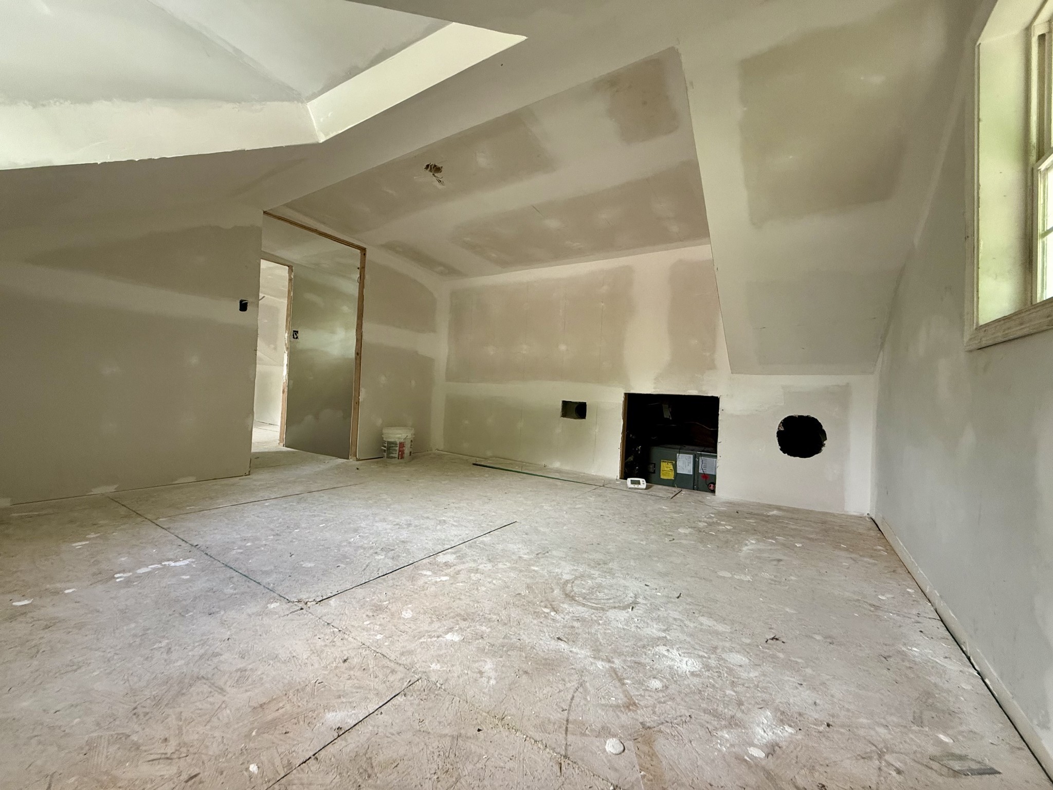 10261-2 Bridge Street Columbia, TN 38401 - Photo 8 of 14 a view of an empty room with a fireplace and window
