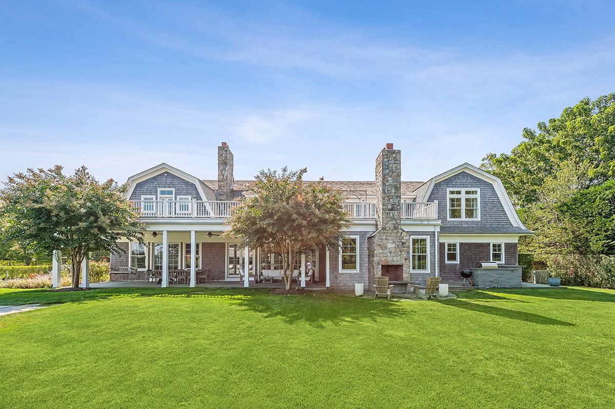 63 Newlight Lane Bridgehampton, NY 11976 - Photo 36 of 37 a front view of a house with a yard