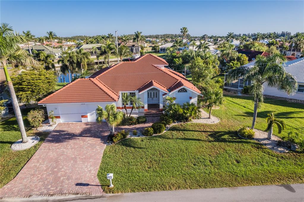 1206 Partridge Drive Punta Gorda, FL 33950 - Photo 1 of 1 Front of Home Faces South