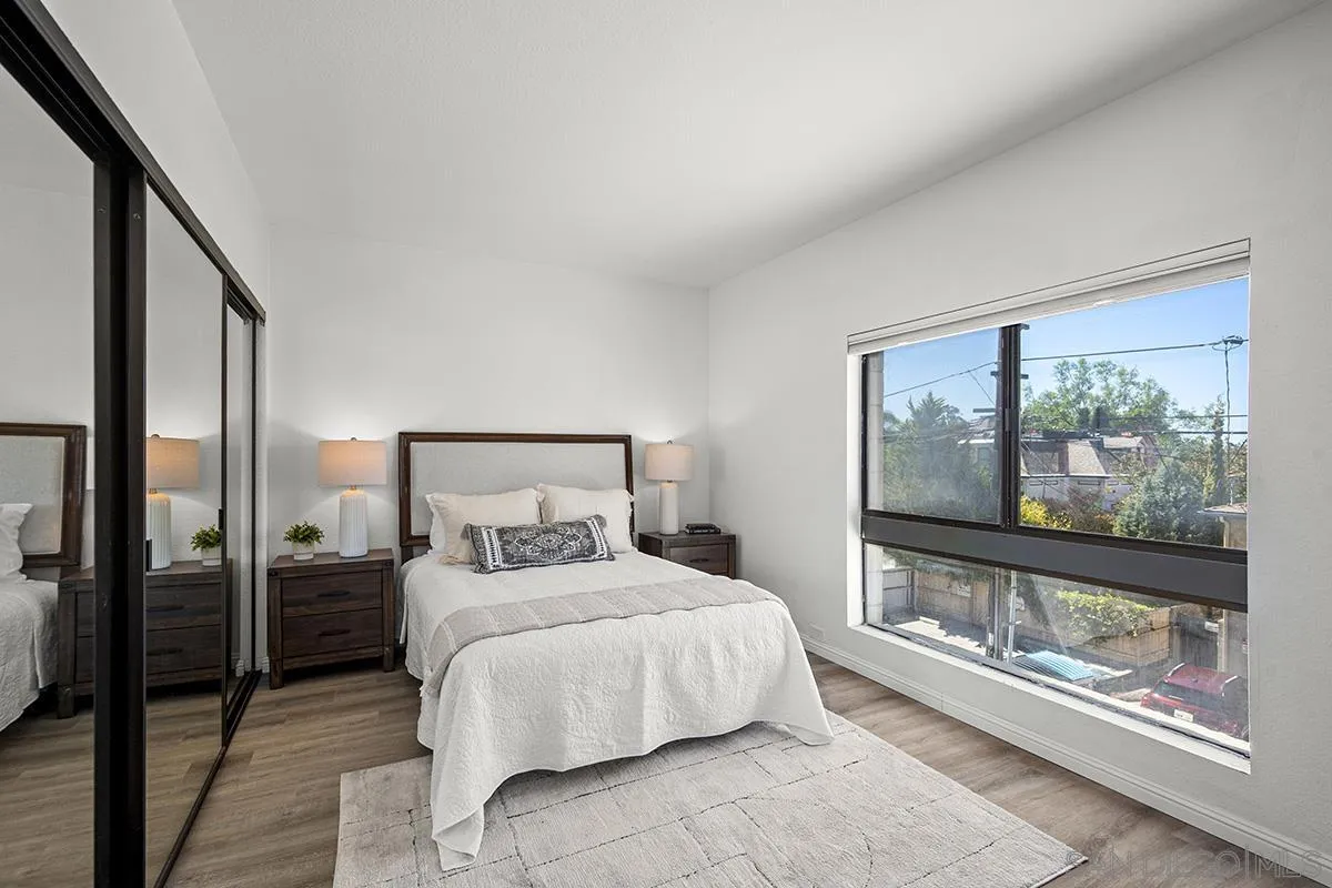 3570 1st Avenue, Unit 1 San Diego, CA 92103 - Photo 27 of 55 a bedroom with a large bed and a large window