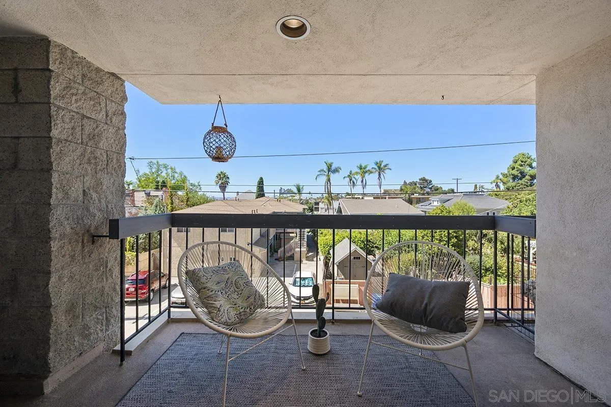 3570 1st Avenue, Unit 1 San Diego, CA 92103 - Photo 7 of 55 a room with furniture and floor to ceiling window