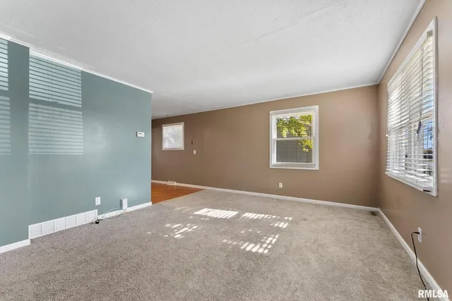 a view of an empty room with window