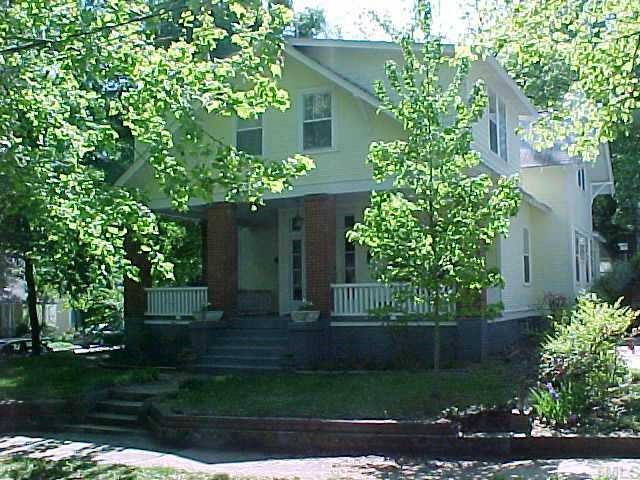 1201 Filmore Street Raleigh, NC 27605 - Photo 1 of 1 front view of a house with a garden