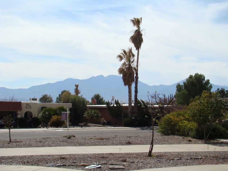 1443 North Rio-Aros Green Valley, AZ 85614 - Photo 18 of 19 a view of a street with a building in the background