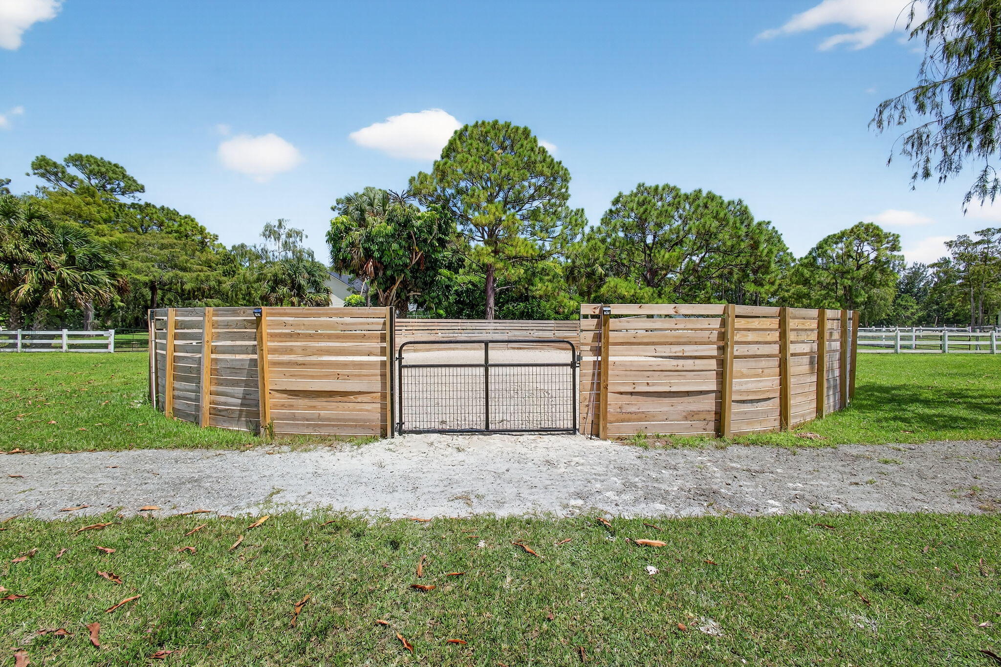 17218 Shetland Lane, Unit 2 STALLS Loxahatchee, FL 33470 - Photo 13 of 54 a view of a backyard