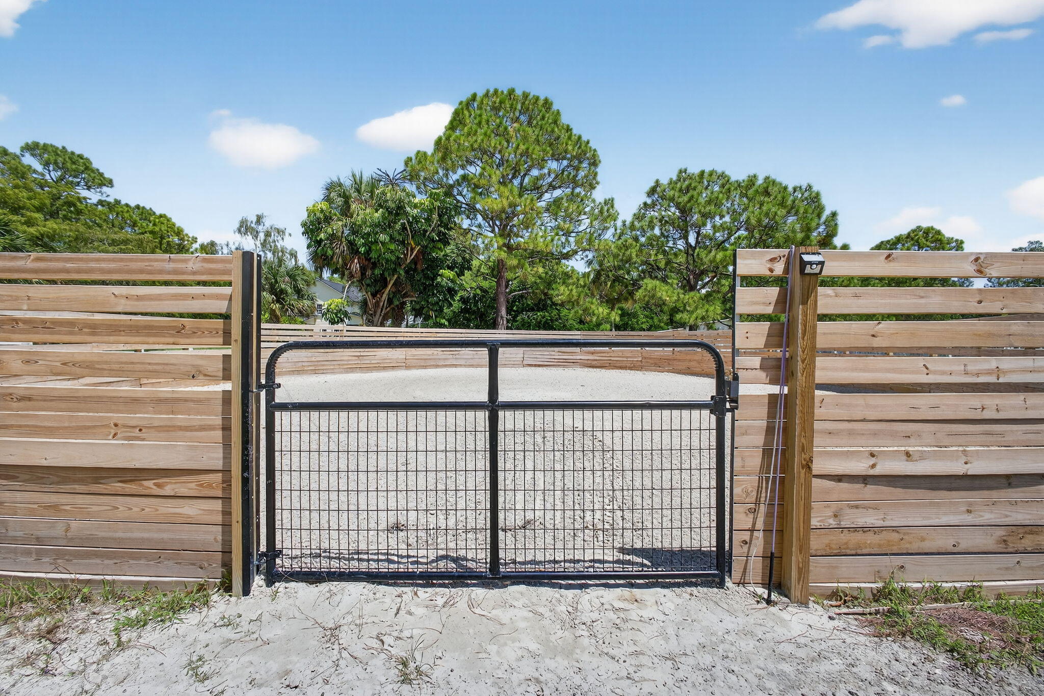 17218 Shetland Lane, Unit 2 STALLS Loxahatchee, FL 33470 - Photo 14 of 54 a view of a house with a backyard
