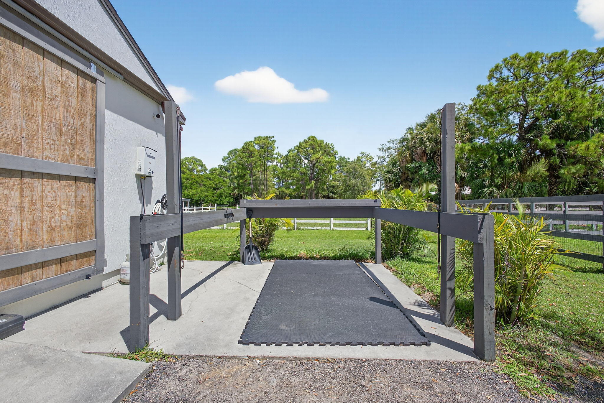 17218 Shetland Lane, Unit 2 STALLS Loxahatchee, FL 33470 - Photo 21 of 54 a view of a garden with pathway