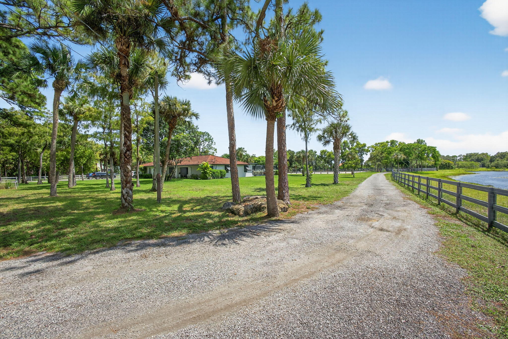 17218 Shetland Lane, Unit 2 STALLS Loxahatchee, FL 33470 - Photo 26 of 54 a view of a park with large trees