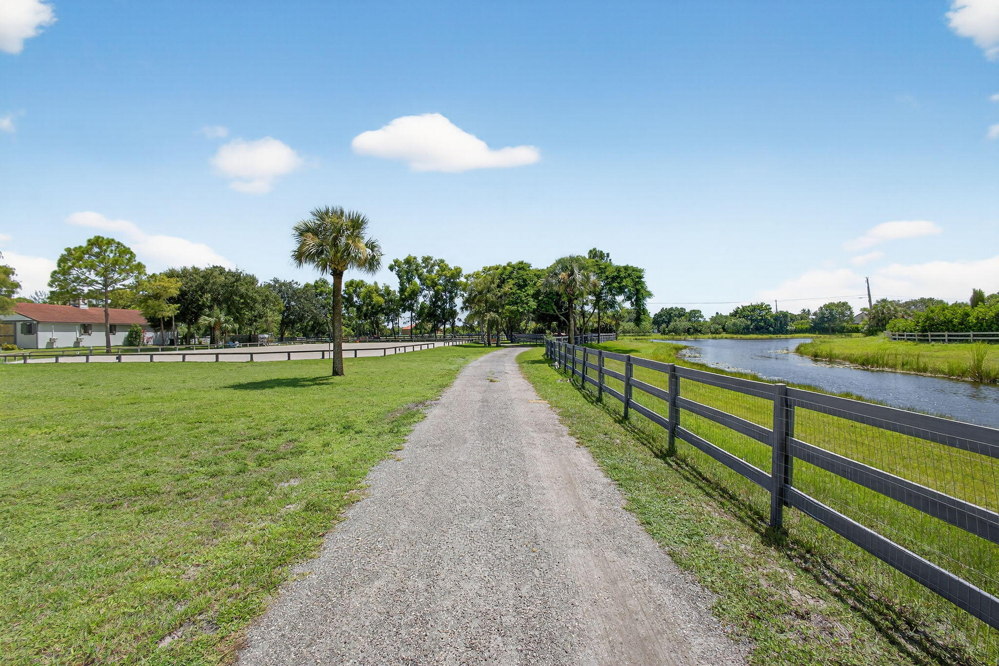 17218 Shetland Lane, Unit 2 STALLS Loxahatchee, FL 33470 - Photo 27 of 54 a view of park with large trees