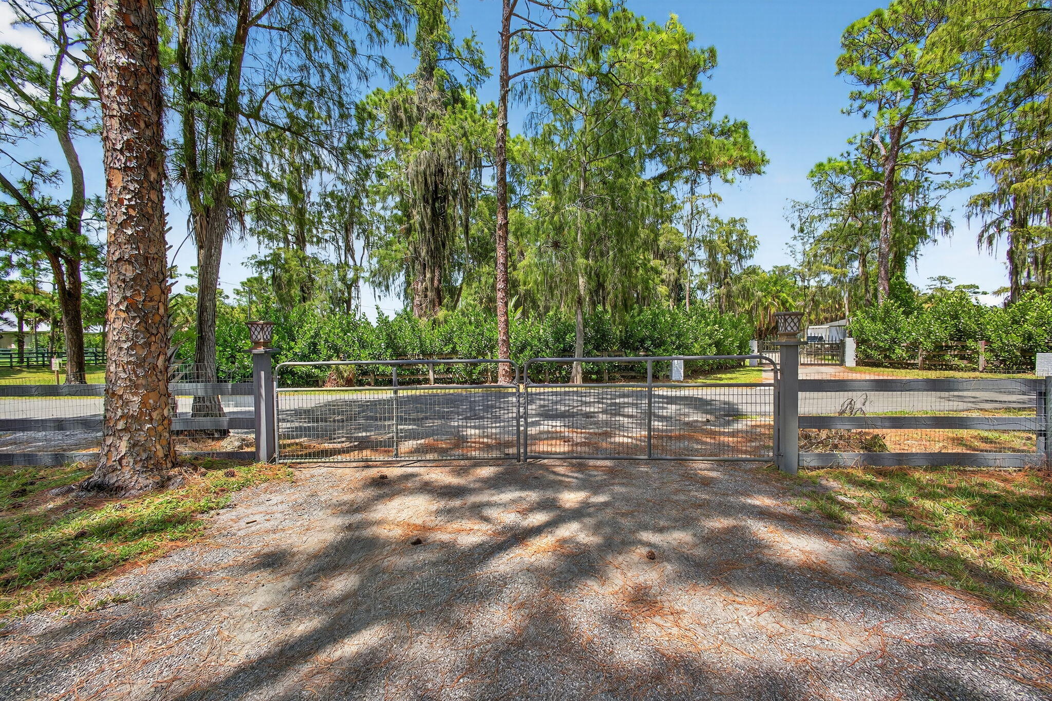 17218 Shetland Lane, Unit 2 STALLS Loxahatchee, FL 33470 - Photo 28 of 54 a view of a park with large trees