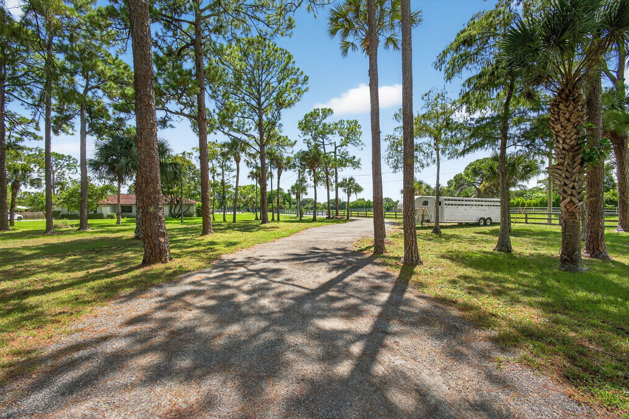 17218 Shetland Lane, Unit 2 STALLS Loxahatchee, FL 33470 - Photo 29 of 54 a view of a park with tree s