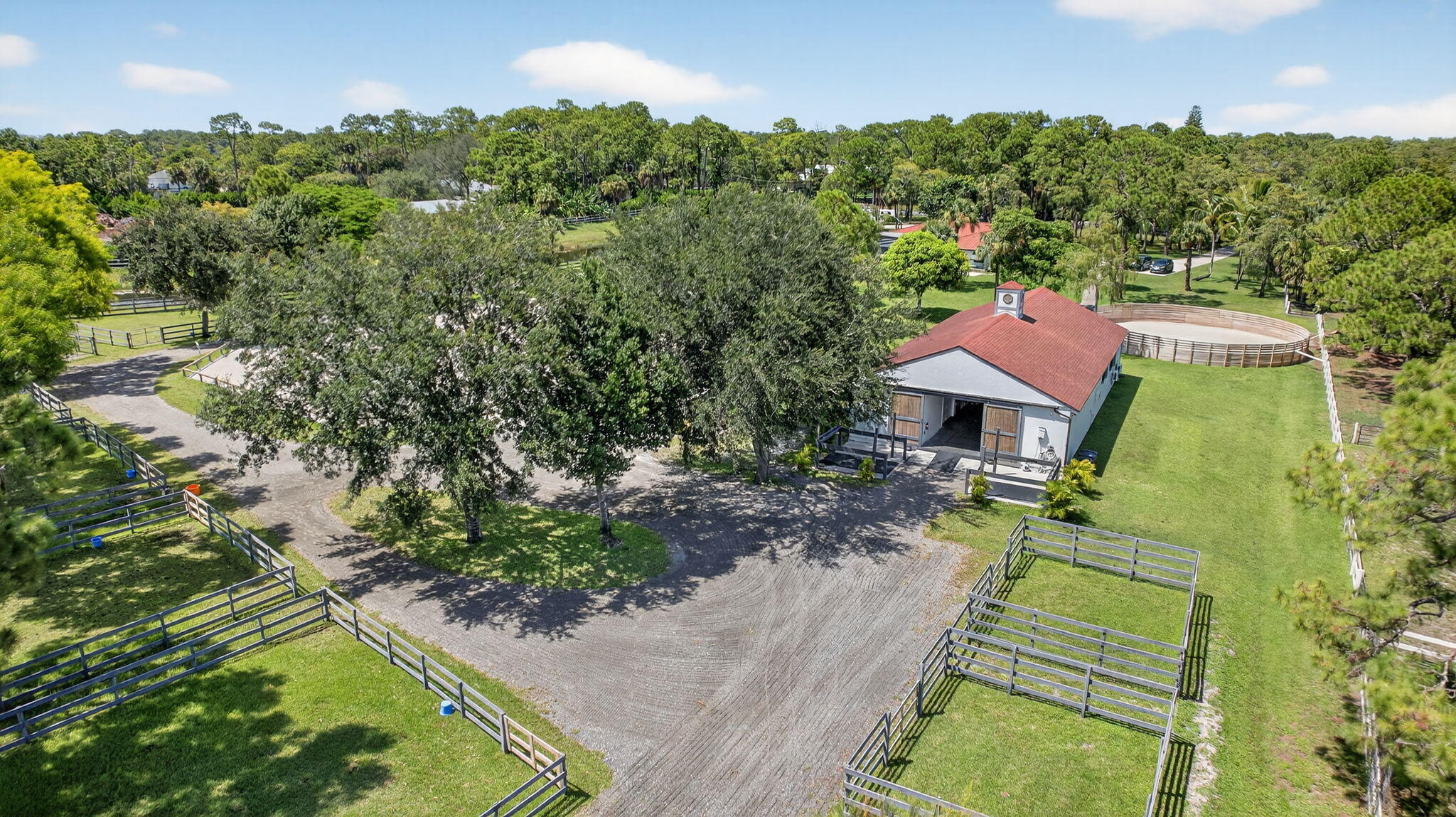 17218 Shetland Lane, Unit 2 STALLS Loxahatchee, FL 33470 - Photo 31 of 54 an aerial view of a house with a yard