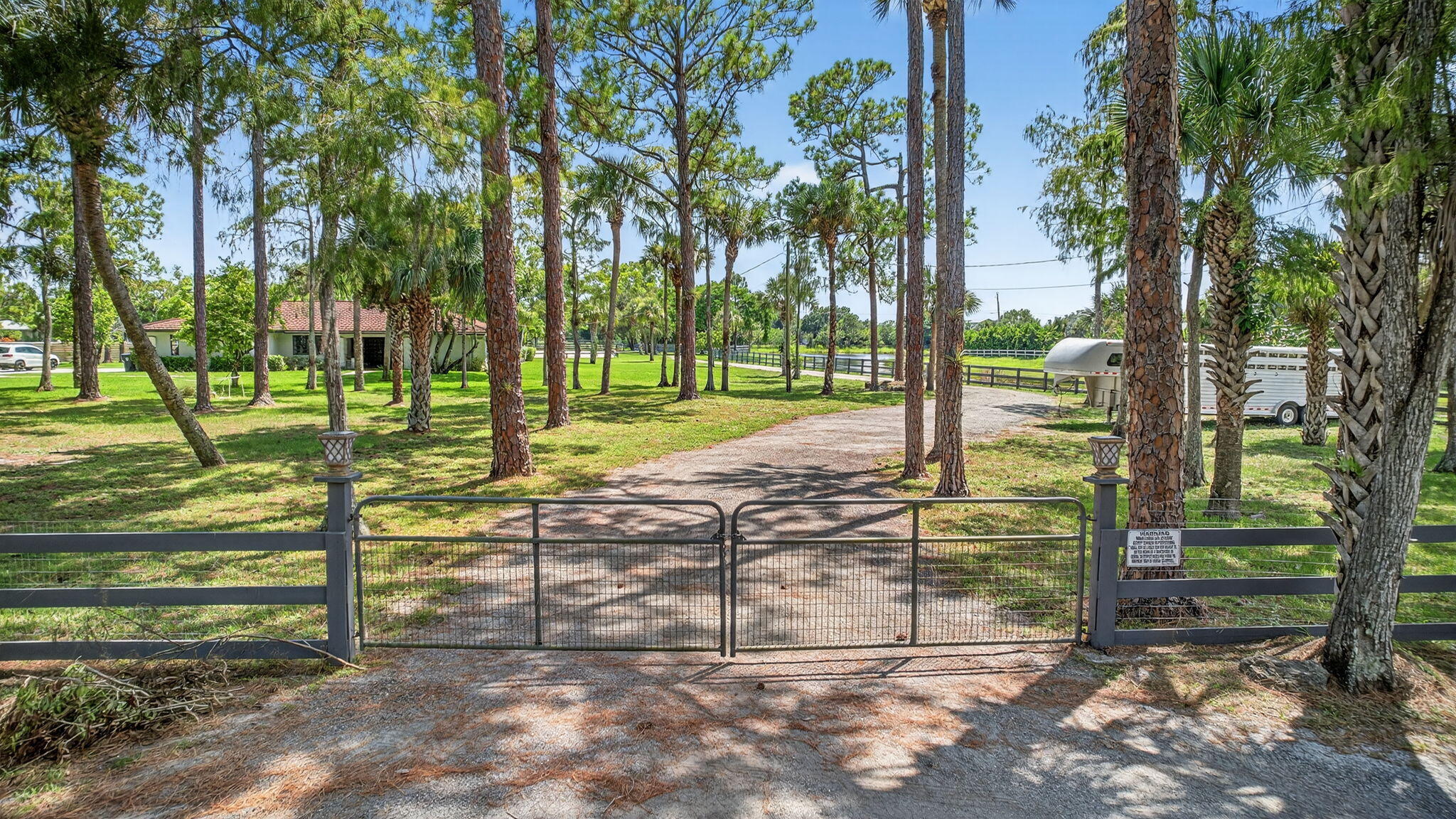 17218 Shetland Lane, Unit 2 STALLS Loxahatchee, FL 33470 - Photo 34 of 54 a view of a park with large trees
