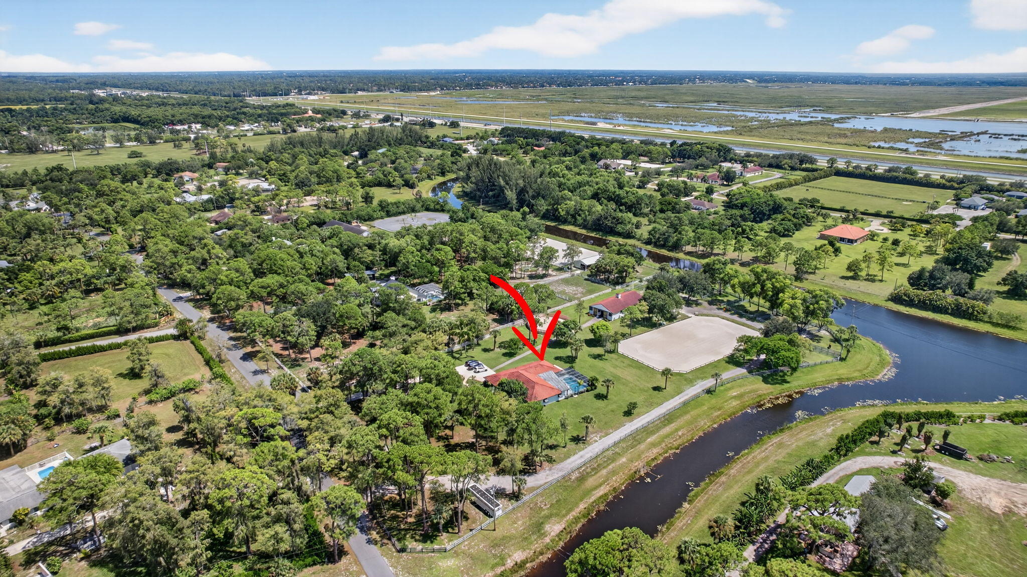 17218 Shetland Lane, Unit 2 STALLS Loxahatchee, FL 33470 - Photo 38 of 54 an aerial view of a city