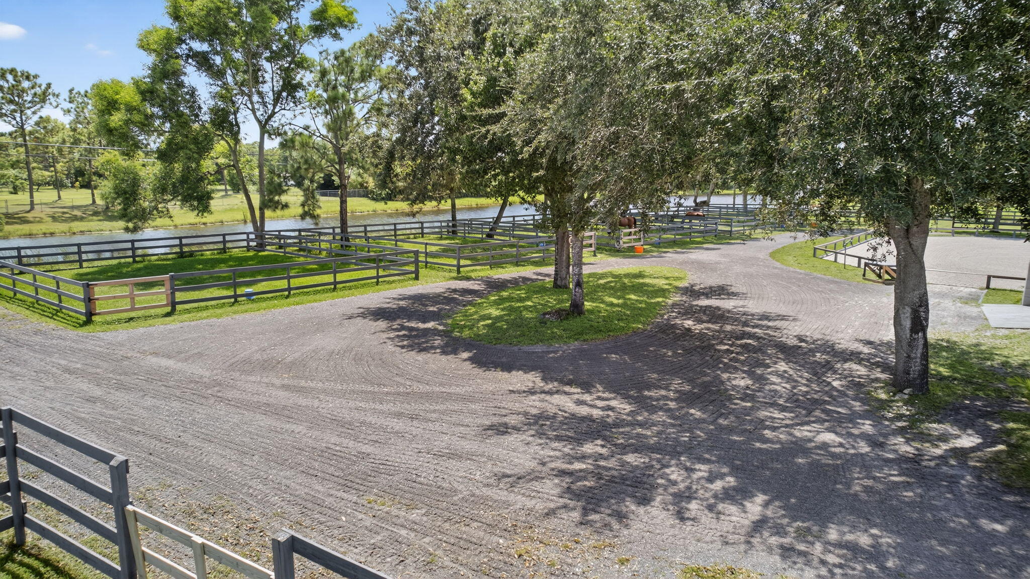 17218 Shetland Lane, Unit 2 STALLS Loxahatchee, FL 33470 - Photo 48 of 54 a view of a park with large trees