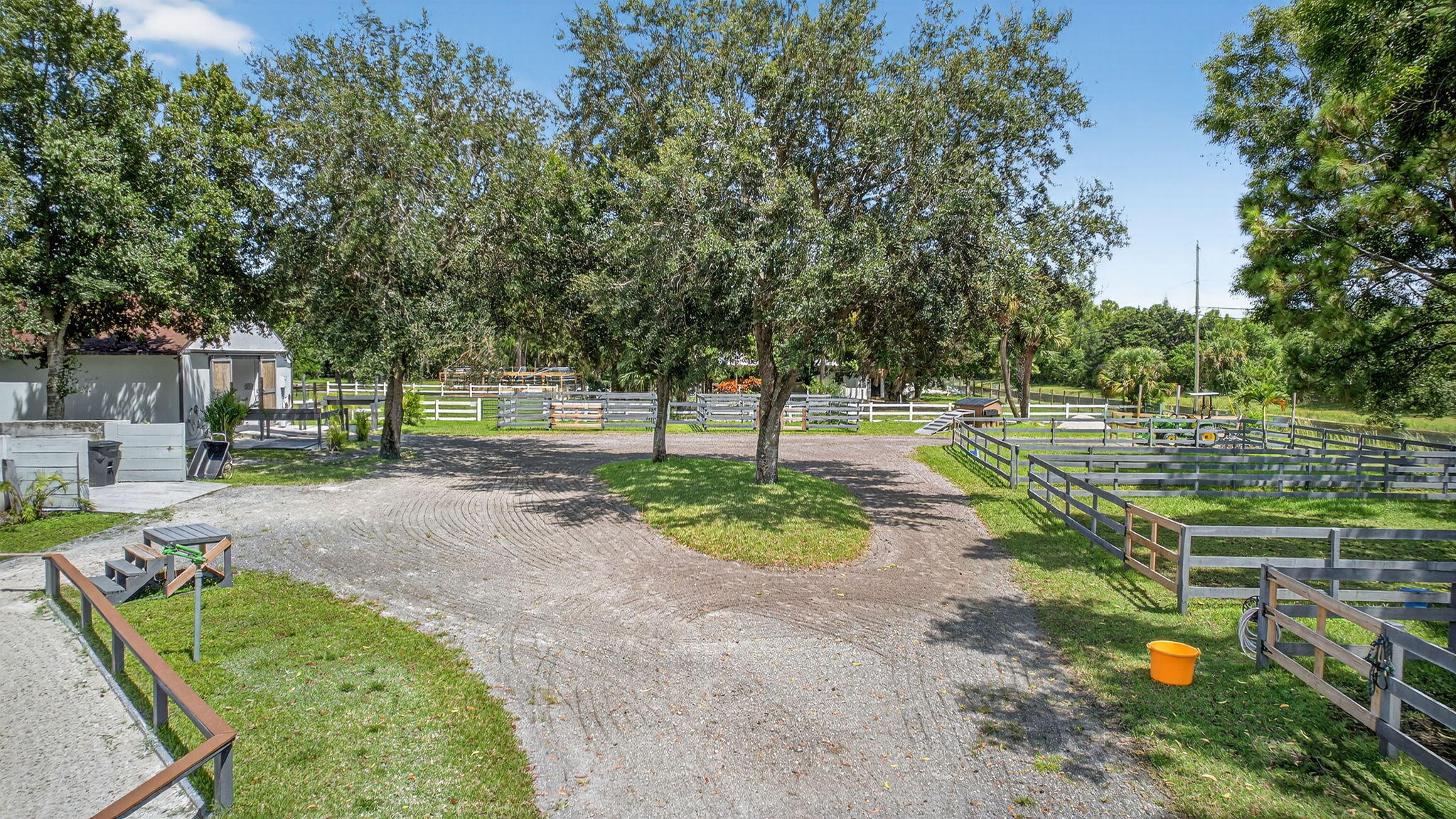 17218 Shetland Lane, Unit 2 STALLS Loxahatchee, FL 33470 - Photo 50 of 54 a view of a park with large trees