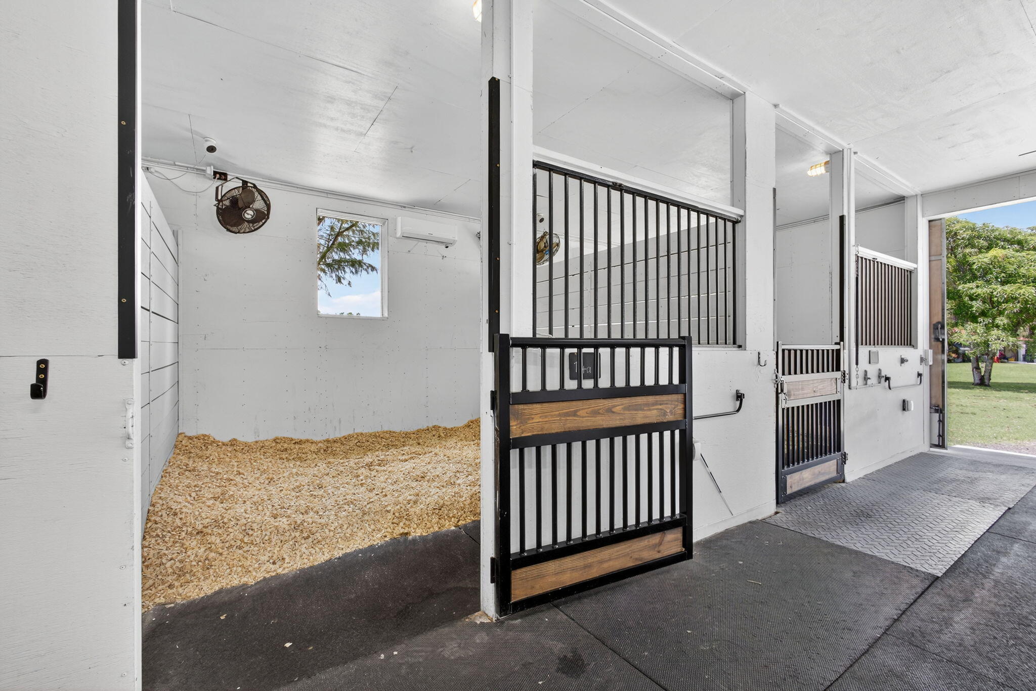 17218 Shetland Lane, Unit 2 STALLS Loxahatchee, FL 33470 - Photo 5 of 54 a view of a hallway view with staircase