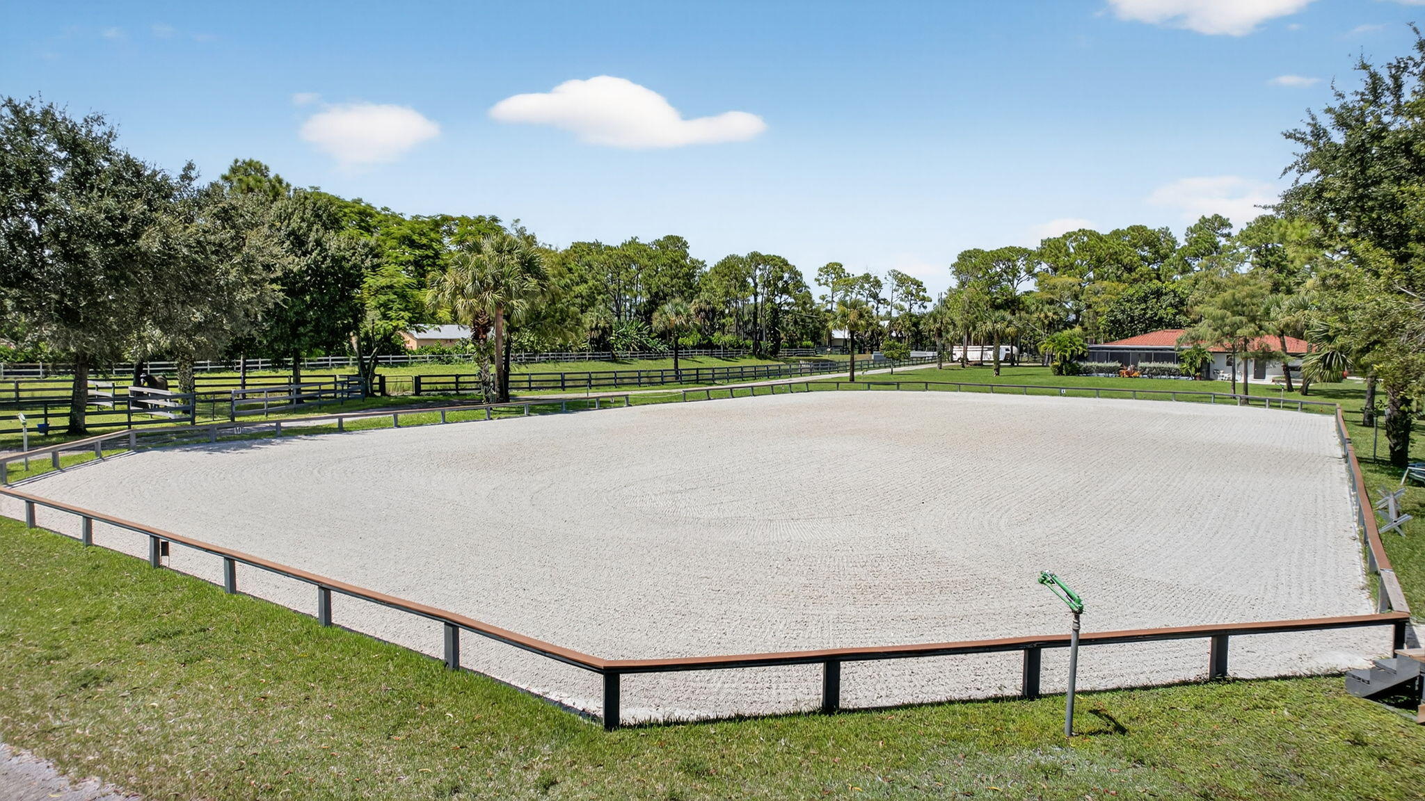 17218 Shetland Lane, Unit 2 STALLS Loxahatchee, FL 33470 - Photo 51 of 54 a view of a tennis court