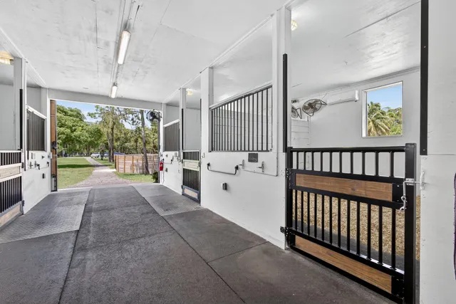 a view of hallway with porch and furniture