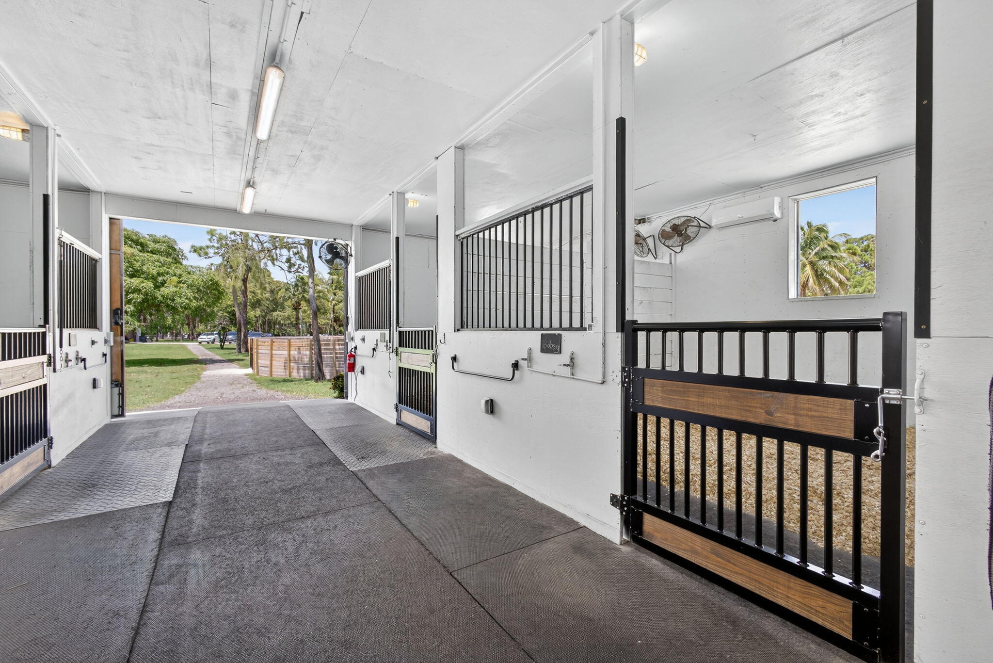 17218 Shetland Lane, Unit 2 STALLS Loxahatchee, FL 33470 - Photo 6 of 54 a view of hallway with porch and furniture