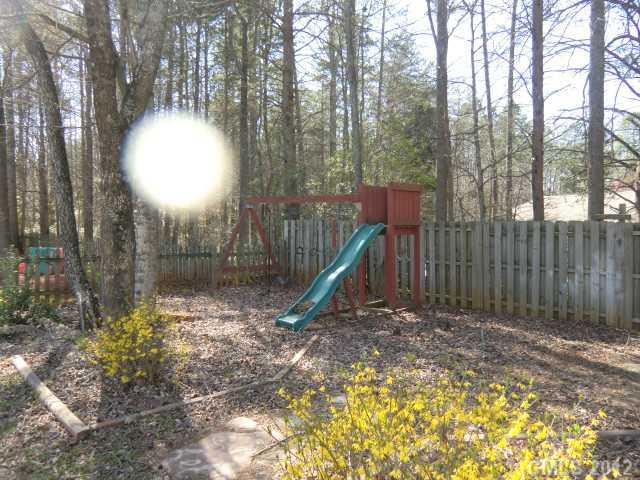 6909 Alanbrook Road Charlotte, NC 28215 - Photo 14 of 14 a view of a backyard