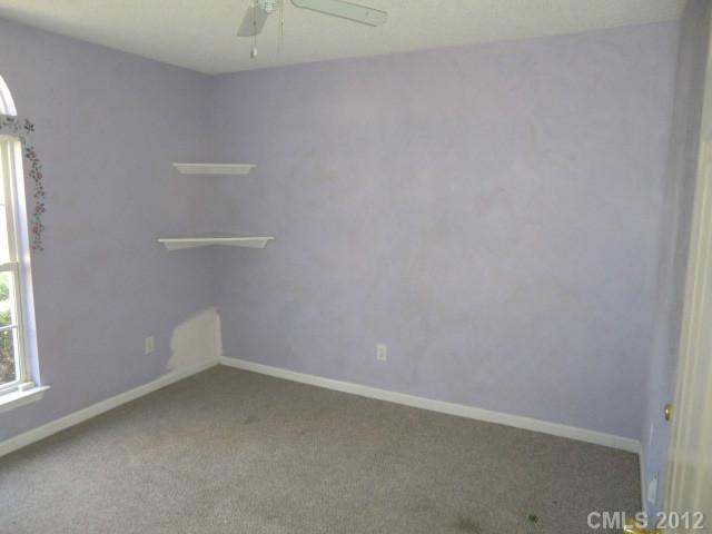 6909 Alanbrook Road Charlotte, NC 28215 - Photo 9 of 14 a view of an empty room