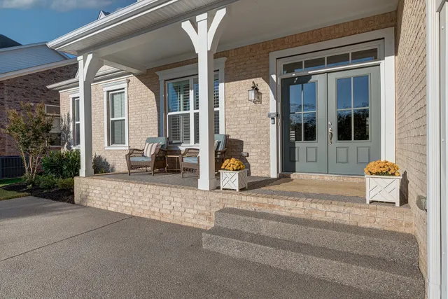 a building exterior with furniture