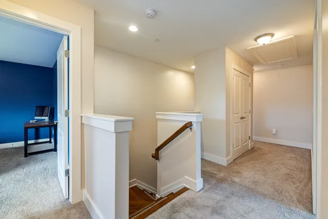 a view of a hallway with elevator