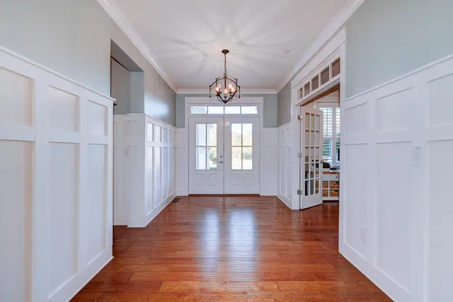 a view of entryway with wooden floor