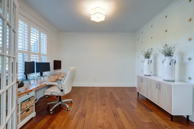 a workspace with furniture and window