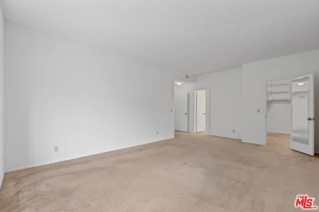 a view of a garden from a balcony