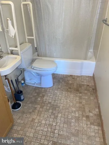a bathroom with a sink and a toilet