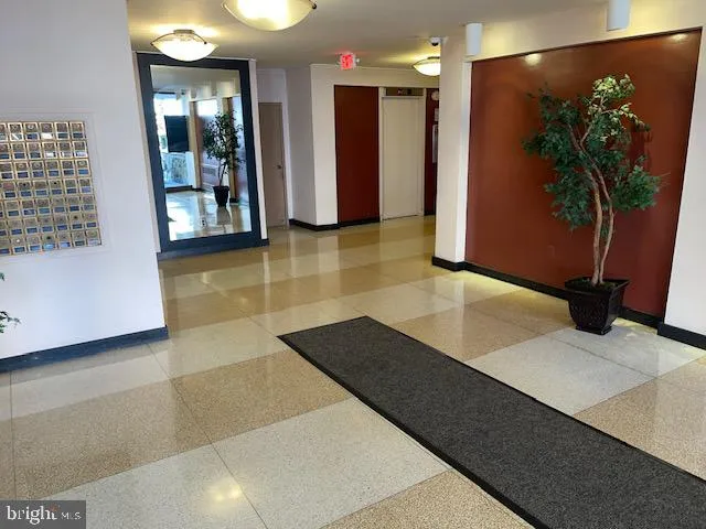 a view of a hallway with dining room