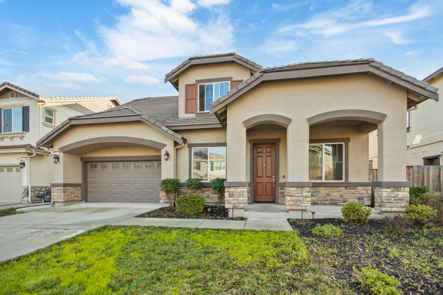617 Copper Ridge Way Oakley, CA 94561 - Photo 1 of 27 a front view of a house with a yard