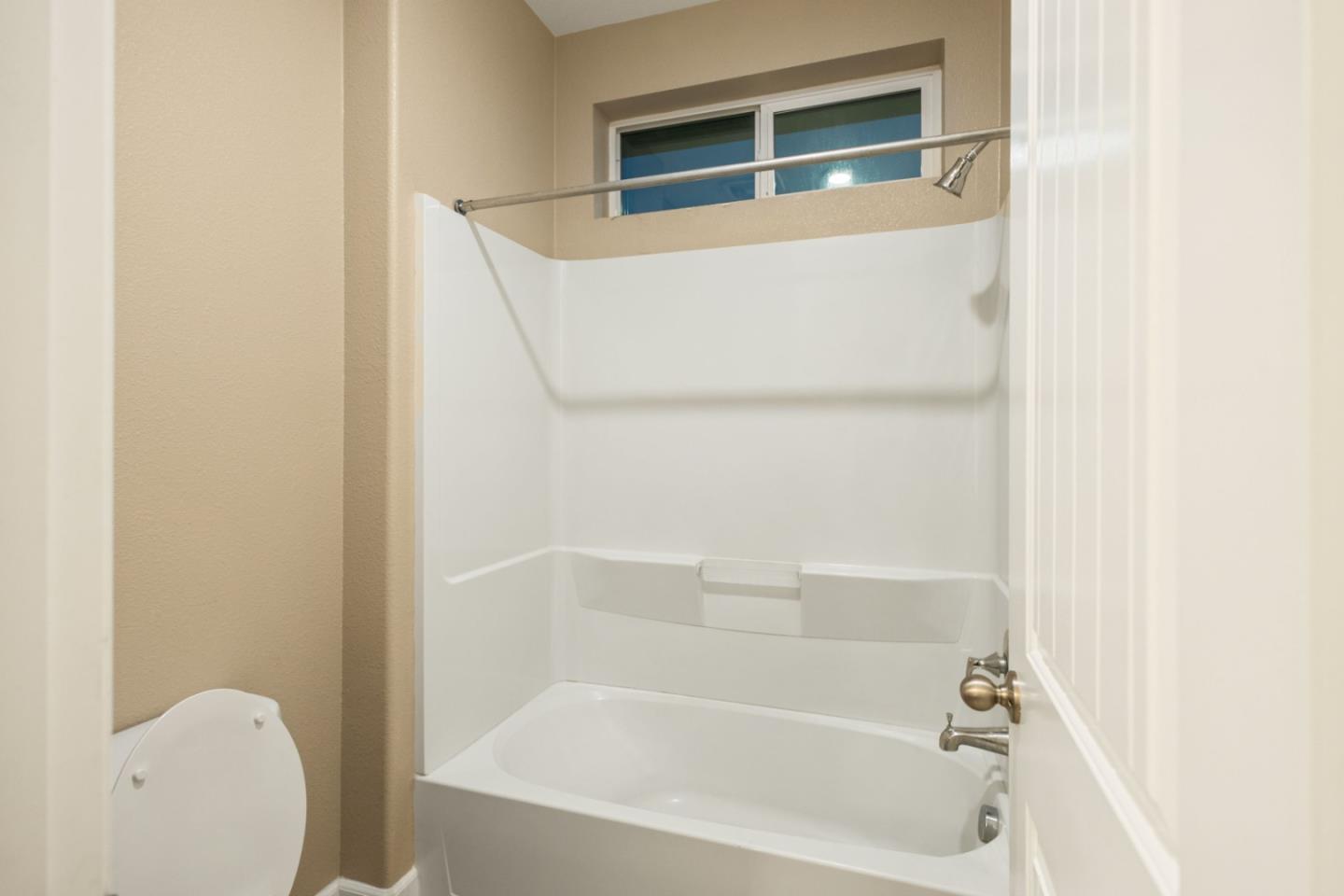617 Copper Ridge Way Oakley, CA 94561 - Photo 23 of 27 a close up of a bathtub in a bathroom