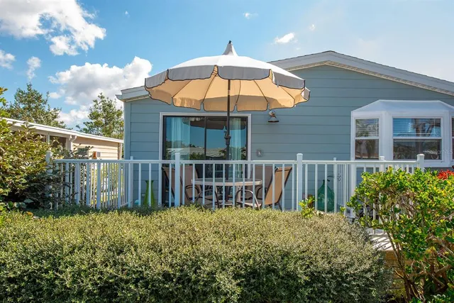 a view of a park with of a house