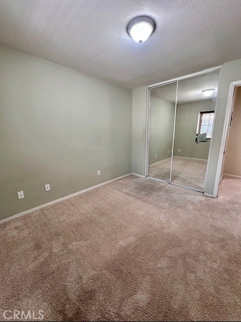 8692 East 9th Street, Unit 56 Rancho Cucamonga, CA 91730 - Photo 19 of 34 an empty room with an entrance