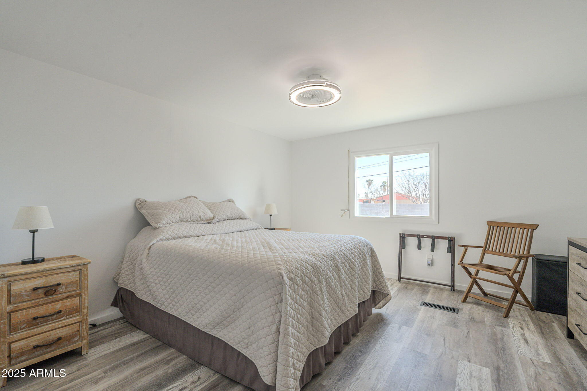 1373 East 23rd Avenue Apache Junction, AZ 85119 - Photo 11 of 53 a bedroom with a bed and a table
