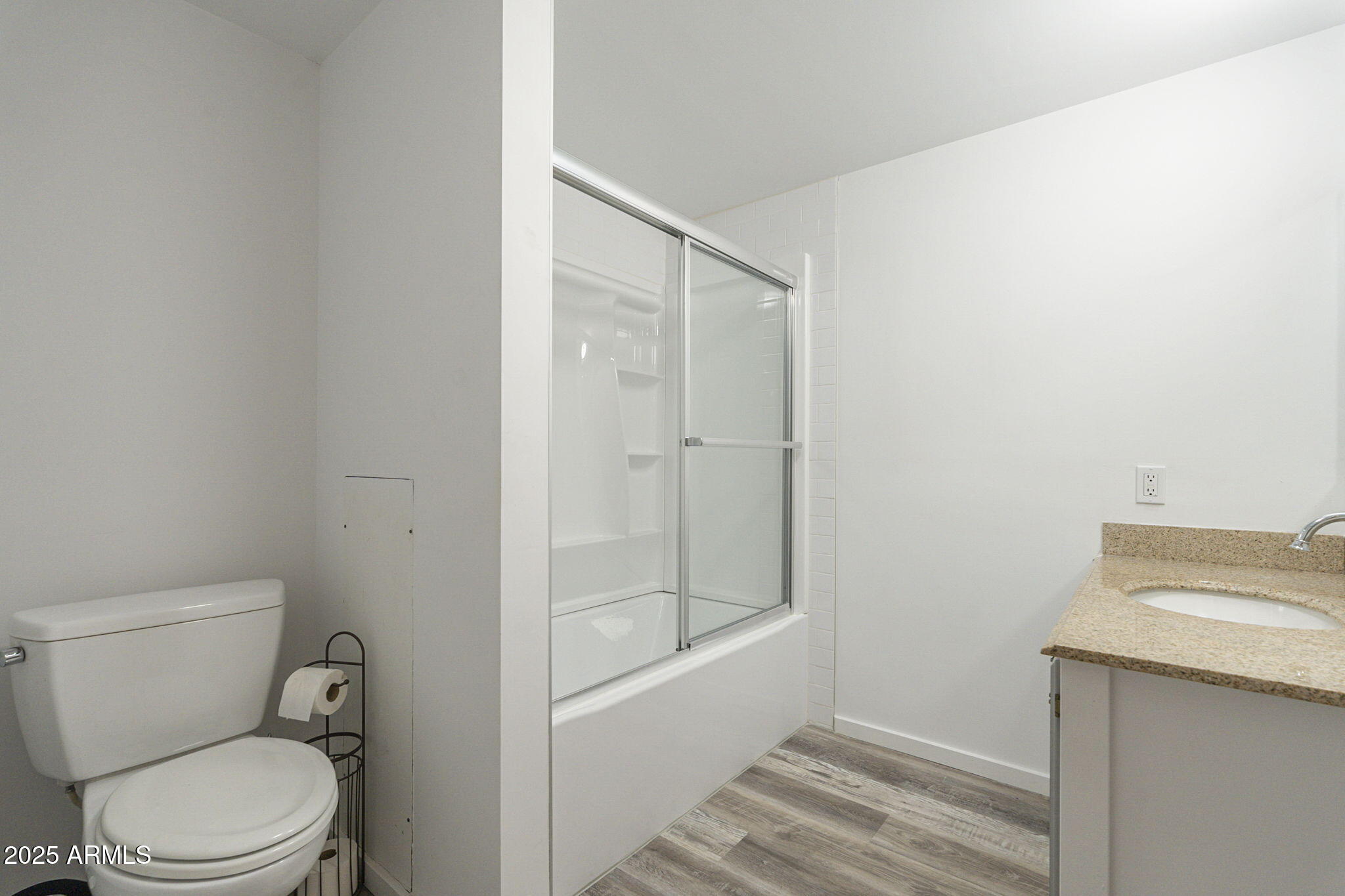 1373 East 23rd Avenue Apache Junction, AZ 85119 - Photo 13 of 53 a bathroom with a toilet a sink and shower