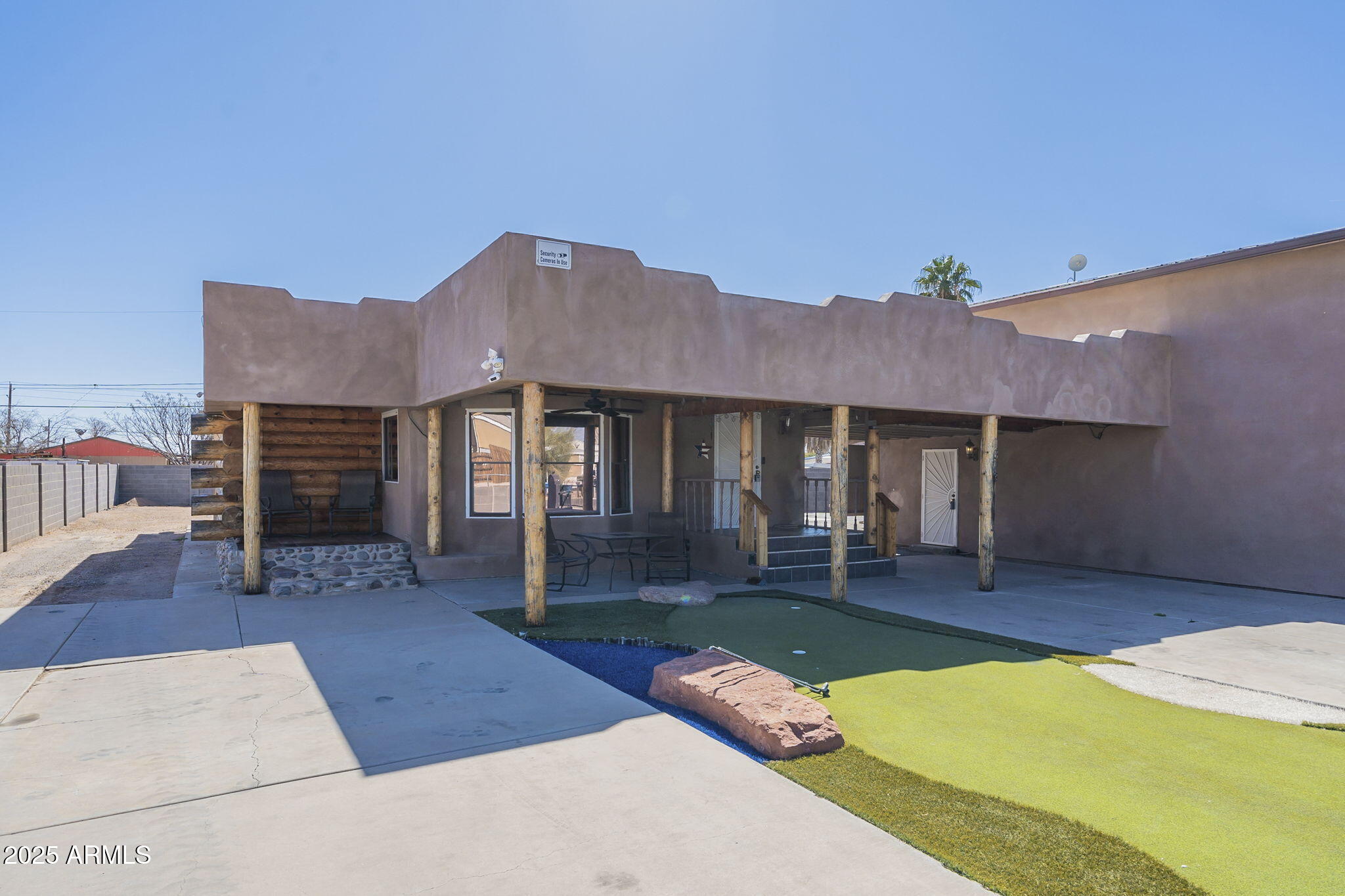 1373 East 23rd Avenue Apache Junction, AZ 85119 - Photo 28 of 53 a backyard of a house with seating space