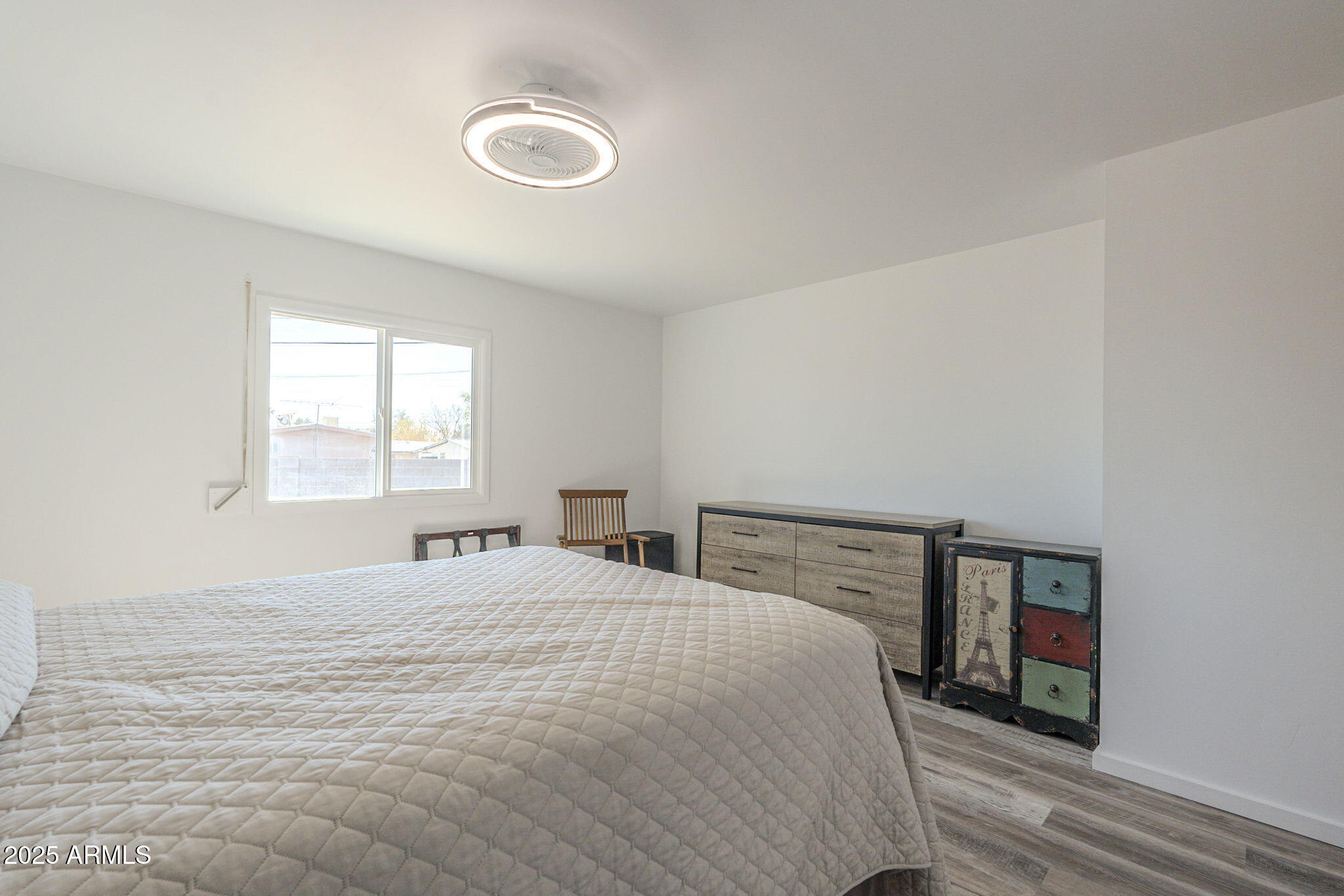 1373 East 23rd Avenue Apache Junction, AZ 85119 - Photo 38 of 53 a bedroom with a bed and a window